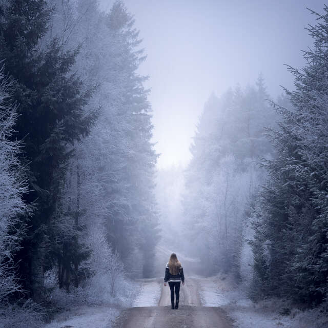 Woman in Winter Landscape
