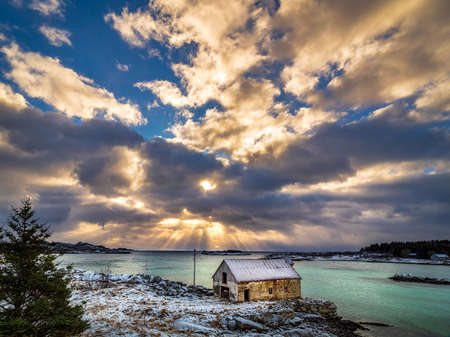 Sun rays and cottage